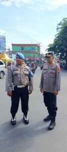 Polsek Krian Pastikan Keamanan Kirab Budaya Klenteng Tridarma Teng Swie Bio Berjalan Lancar
